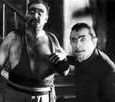 The Undertaker and his manager talk trash before the bout in 1932. (Sadly, the violin they used to play Pop Goes the Weasel got smashed during the match, and the Undertaker lost.) Related PostsMonster of the Day #690 (May 15,...